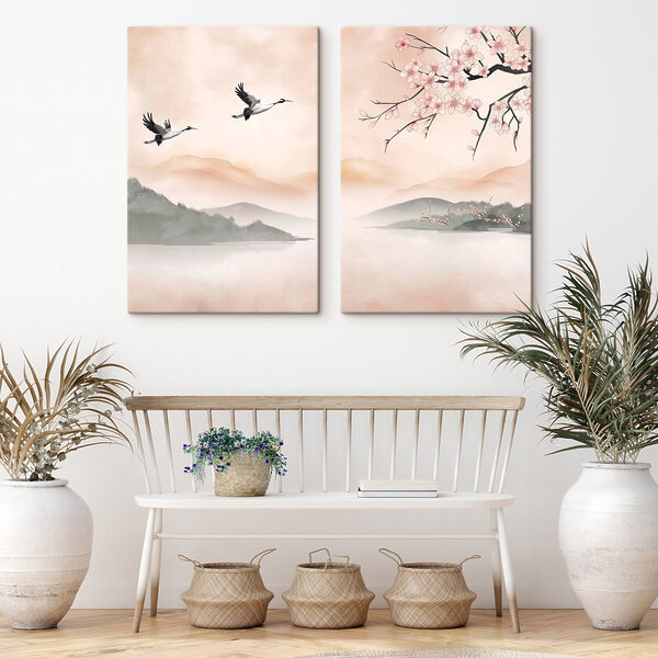 Two birds flying over water