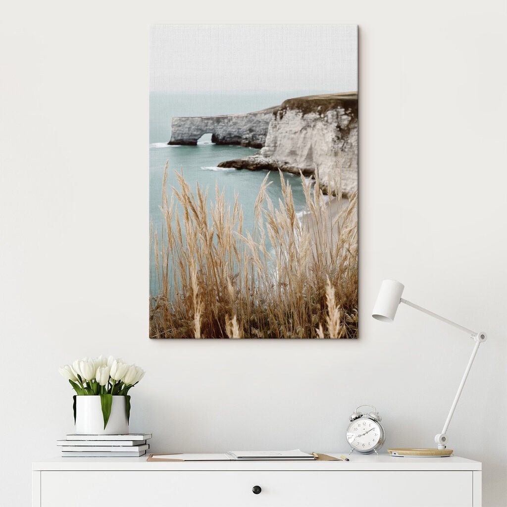 Tall grass next to a body of water