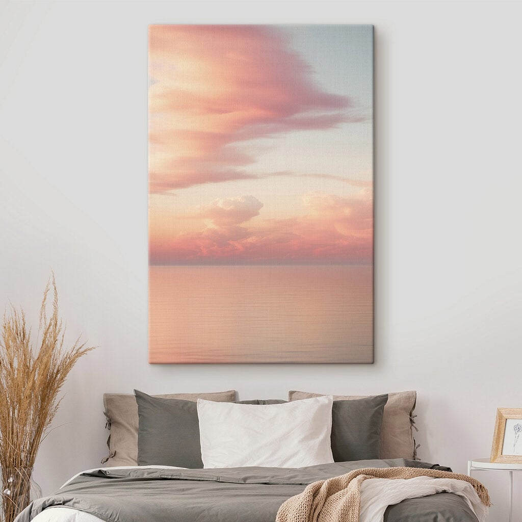Pink clouds over water