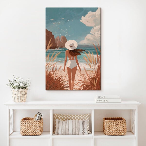 Woman in a swimsuit and hat walking on a beach