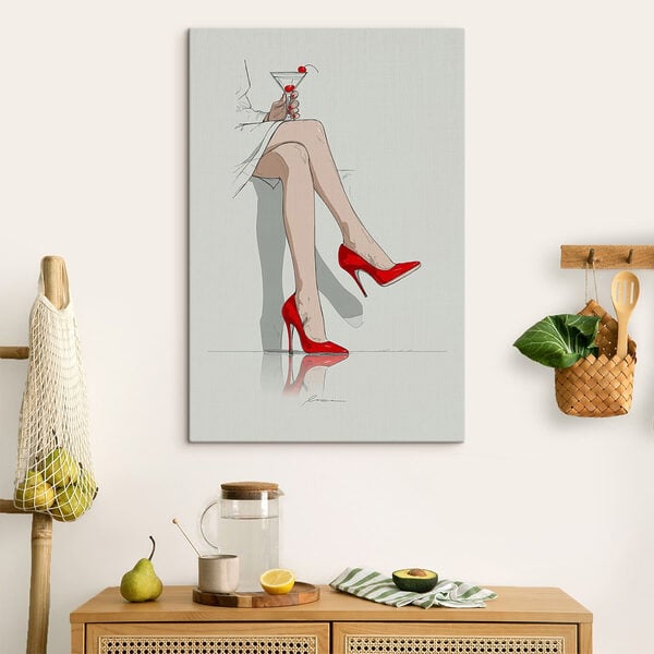 Woman's legs in red high heels