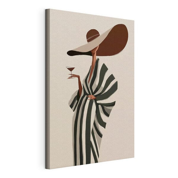 Woman wearing a hat and a large hat holding a glass of wine