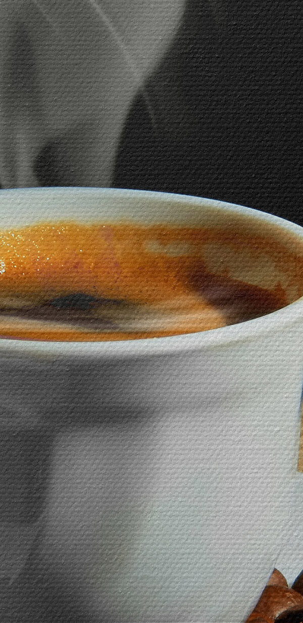 A cup of coffee with smoke on a saucer and beans